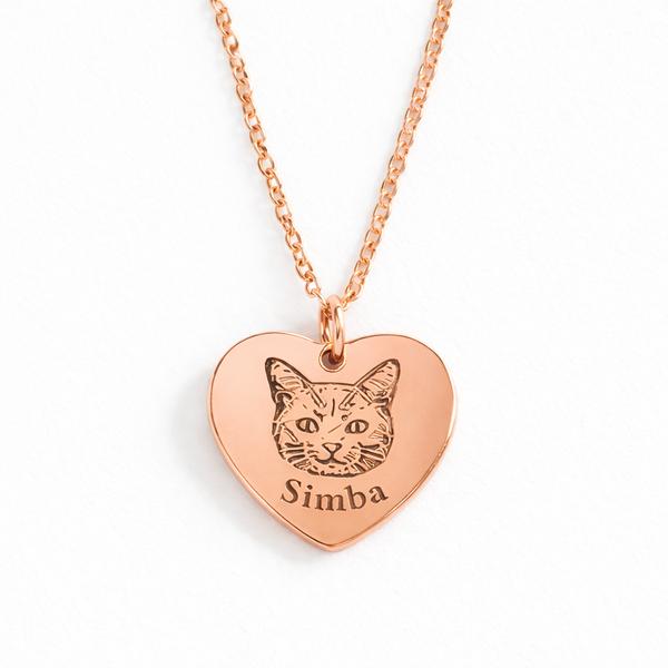 Woman wearing personalized cat ring with engraved pet portrait. Custom cat memorial jewelry handcrafted from pet photo. Sentimental keepsake for cat lovers.